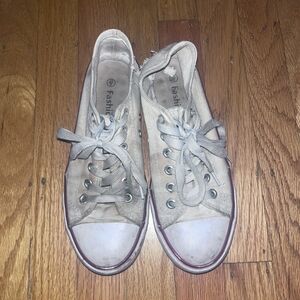 Extremely Worn Low Top Sneakers
